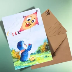 Herbst-Postkarte mit Pinguin & Drachen – Lustige Grußkarte DIN A6 auf Kraftpapier