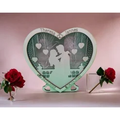 Hochzeitsherz beleuchtet, mit der Silhouette eines Brautpaar, personalisierbar mit Namen und Daten