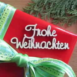 Holz-"Frohe Weihnachten"-Schriftzug klein
