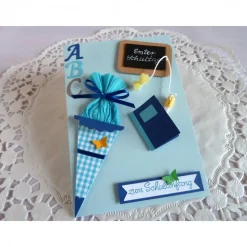 Karte zur Einschulung, Schulanfang, erster Schultag, ABC Karte in hellblau für einen Jungen