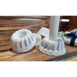 Kerzenhalter in Form eines Gugelhupfes