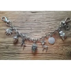 Kinder - Charivari, antik-silberfarben, 7 Trachtenanhänger, ca. 20,5 cm