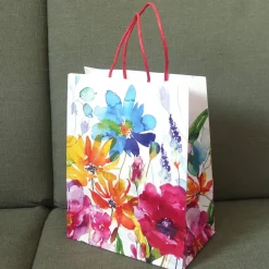 Kleine Papier Tragetasche mit bunten Blumen