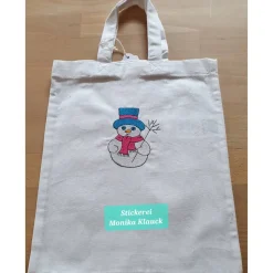 Kleine Stofftasche, mit Schneemann bestickt