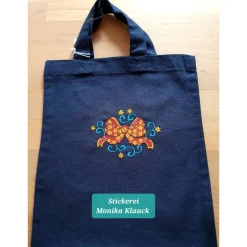 Kleine Stofftasche, mit Weihnachtsschleife bestickt