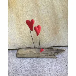 Liebe auf Treibholz, Herzen auf Schwemmholz