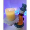 Lustiger Schneemann mit Kerze