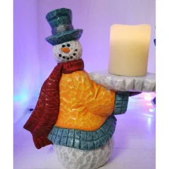 Lustiger Schneemann mit Kerze