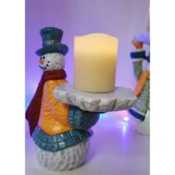 Lustiger Schneemann mit Kerze