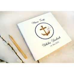 maritimes Gästebuch & Album zur Taufe mit Anker & Sprenkeln in Marineblau & Kupfer; blanko oder mit Fragen