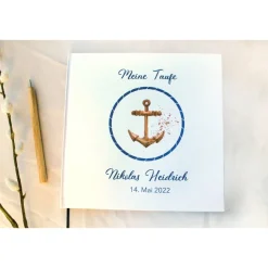 maritimes Gästebuch & Album zur Taufe mit Anker & Sprenkeln in Marineblau & Kupfer; blanko oder mit Fragen