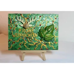Minibild FROHE WEIHNACHTEN Minibild, kleine Weihnachtsdeko mit Rentierkopf aus Holz Blatt aus Styropor