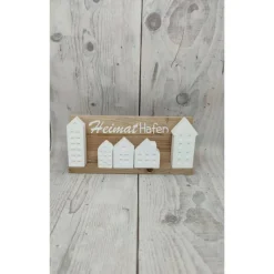 Minihäuser auf Holzklötzchen und Plott