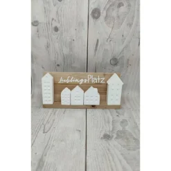 Minihäuser auf Holzklötzchen und Plott