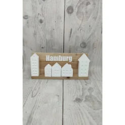 Minihäuser auf Holzklötzchen und Plott