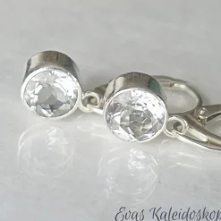 Ohrbrisuren mit großen runden Weißtopasen in Silberfassung