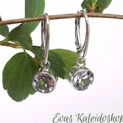 Ohrbrisuren mit großen runden Weißtopasen in Silberfassung