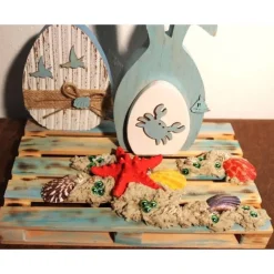 Osterdeko MARITIM  Collage auf einer kleinen Holzpalette Osterdekoration Osterhase Osterei Seestern Muscheln Ostern