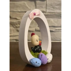 Osterdekoration - Osterei mit Schleife und Osterküken