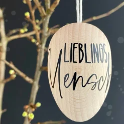 Osterei aus Holz | mit Namen schwarz/gold