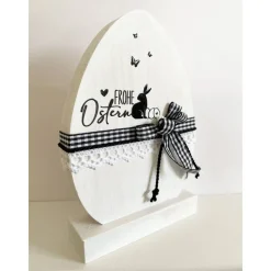 Osterei aus Holz auf Sockel, weiß/schwarz, Ostern