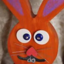Osterhase Hasenfigur ORANGE zauberhafter Holzhase mit handgestrickten Accessoires bemalt mit Acrylfarben Osterdeko