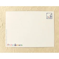 Osterkarte, bunte Schrift auf blau