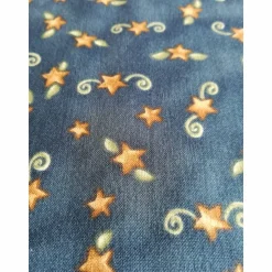 Patchworkstoff - gelbe Sternchen mit Kringel auf blauem Hintergrund,  SSI Studio