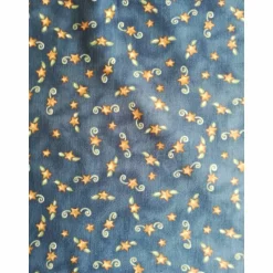 Patchworkstoff - gelbe Sternchen mit Kringel auf blauem Hintergrund,  SSI Studio