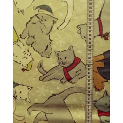 Patchworkstoff Christmas Cats – Zart grüner Baumwollstoff mit Katzen im Schneegestöber
