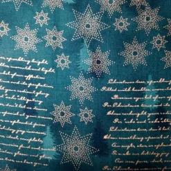 Patchworkstoff Star Springle,  grüner Quiltstoff mit verschiedenen goldenen Sterne