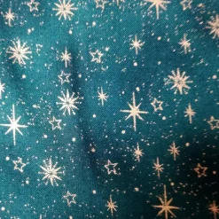 Patchworkstoff Star Springle,  grüner Quiltstoff mit verschiedenen goldenen Sterne