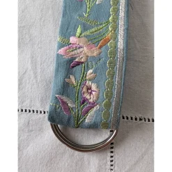 Rockheber aus blaugrauem Baumwollsatin mit silberner Blütenstickerei – Skirtlifter für Rock & Kleid