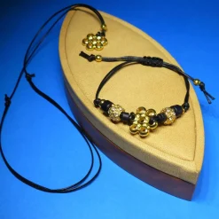 schichtes Schmuckset Blüte, gold schwarz, Halskette und Armband, mit Schiebeknoten, Metallperlen, Schmuck