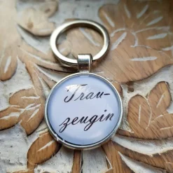 Schlüsselsanhänger Trauzeugin Hochzeit schwarz weiß Cabochon silberfarbe Fassung 25mm Gastgeschenk