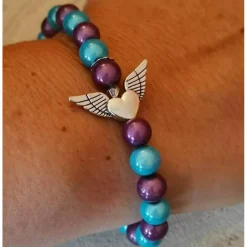 Schmuckset mit eingearbeiteten  Fliegenden Schützenden Engel und mit einem Anhänger