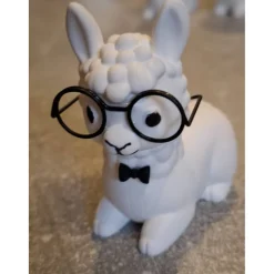 sitzendes kleines Alpaka aus Raysin - niedliche Dekoration