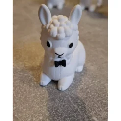 sitzendes kleines Alpaka aus Raysin - niedliche Dekoration