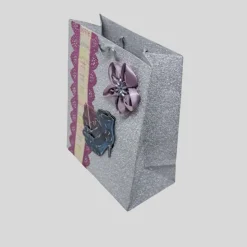 Stilvolle silberne Glitter-Geschenktasche mit 3D-Motiv