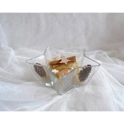 Tischdeko. Glasschale in Sternform mit Weihnachtsdeko in gold