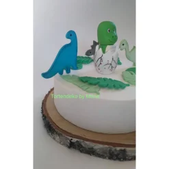 Tortendeko Dino aus den Ei  Urzeittier Tortenaufleger Fondantfigur Zuckerfigur