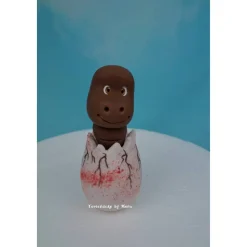 Tortendeko Dino aus den Ei  Urzeittier Tortenaufleger Fondantfigur Zuckerfigur