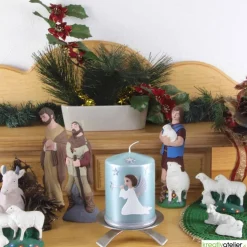 türkise Weihnachtskerze mit Trompetenengel