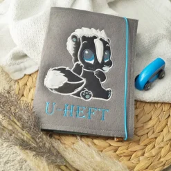 U-Heft-Hülle Stinktier mit praktischen Fächern Filz grau