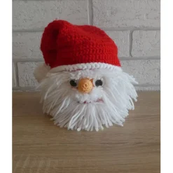 Umhäkelte Blechdose zur Aufbewahrung von vielen Dingen - Weihnachtsmann mit Kulleraugen