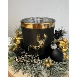 Weihnachtsdeko auf Baumscheibe mit Teelichtglas