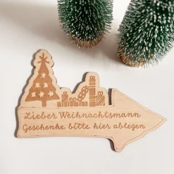Weihnachtsdekoration, Holzschild mit Spruch "Geschenke bitte hier ablegen"
