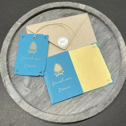 Weihnachtskarte „Frohes Fest“ mit Geschenkanhänger