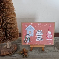 Weihnachtskarte mit Weihnachtsmann - Pinguin - Schneeflocken