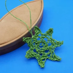 Weihnachtsstern gehäkelt, Papiergarn, grün, 7 Spitzen, Weihnachtsdeko, Advent, Dekoration, Geschenkanhänger, Baumschmuck